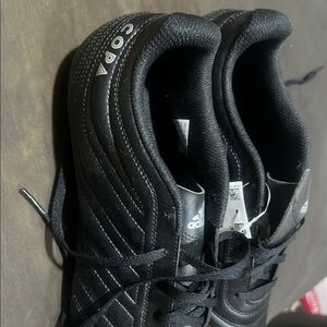Adidas Black Athletic Shoes with Sleek Design and Textured Upper